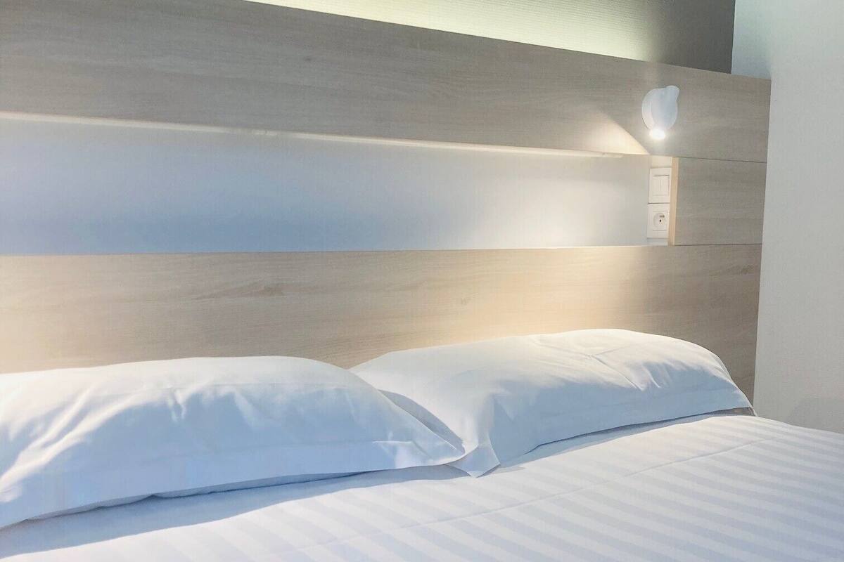 superior double room | desk, laptop workspace, blackout curtains, iron/ironing board