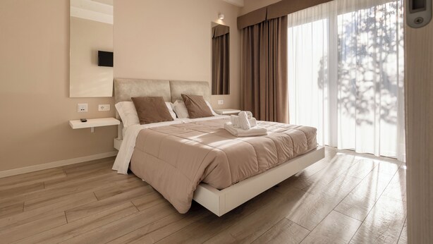 Superior Apartment, 1 Bedroom | Premium bedding, in-room safe, soundproofing - Aurora ApartHotel (Peschiera del Garda)
