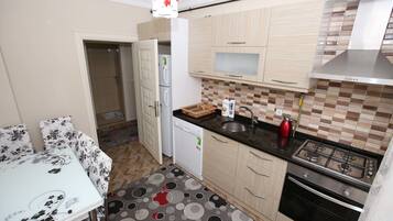 Family Apartment, 2 Bedrooms, Sea View, Sea Facing | Private kitchen | Full-sized fridge, oven, stovetop, dishwasher