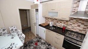 Family Apartment, 2 Bedrooms, Sea View, Sea Facing | Private kitchen | Full-size fridge, oven, stovetop, dishwasher