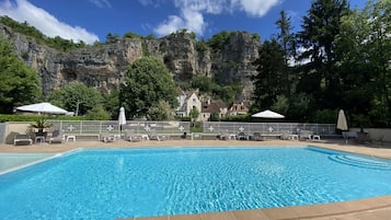 Outdoor pool, open 9:00 AM to 8:00 PM, free pool cabanas, pool umbrellas