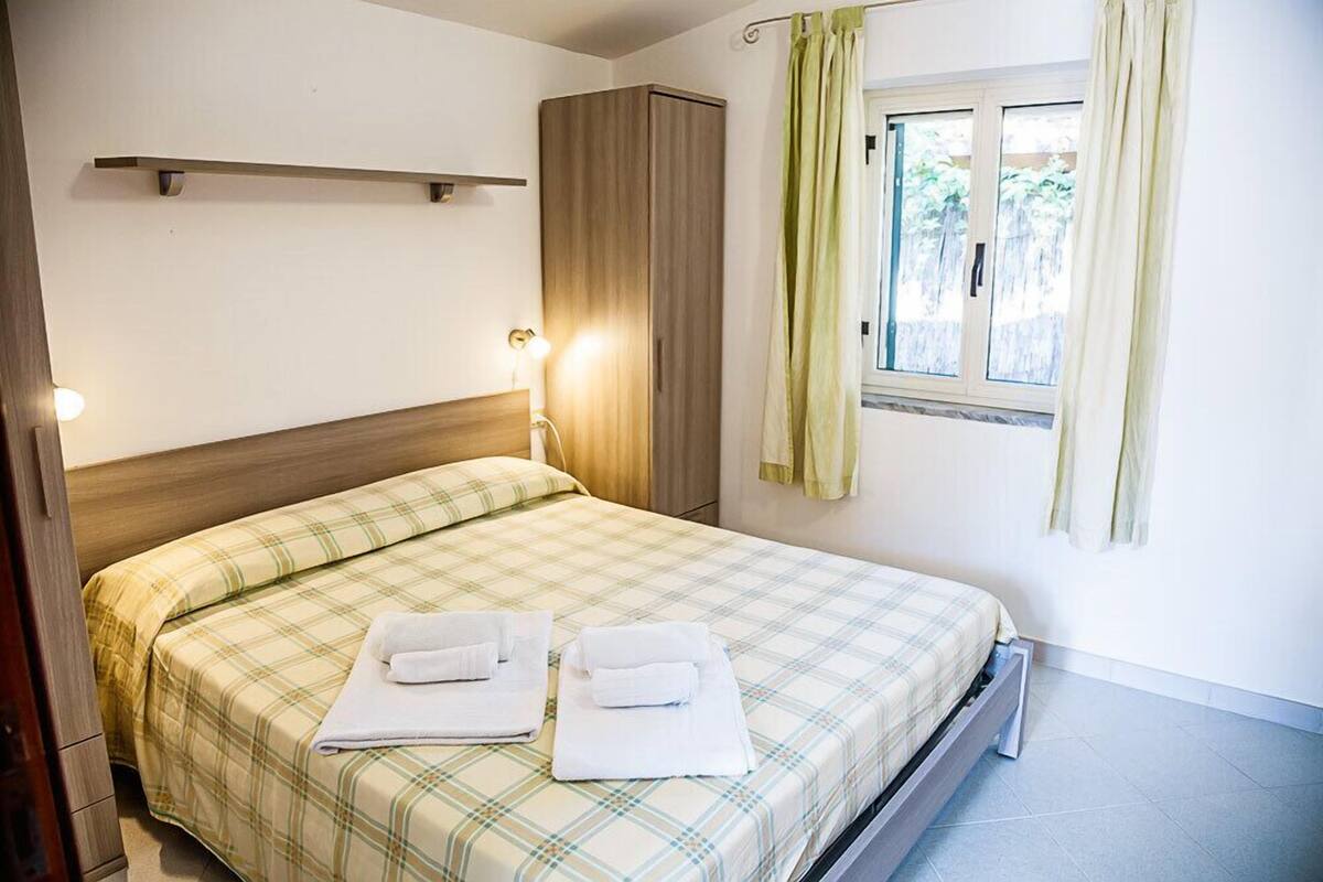 Apartamento Confort, 2 habitaciones | Caja fuerte y ropa de cama