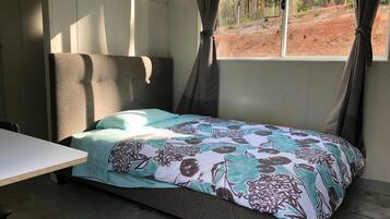 Comfort Room, Garden View | Blackout curtains, iron/ironing board, free WiFi