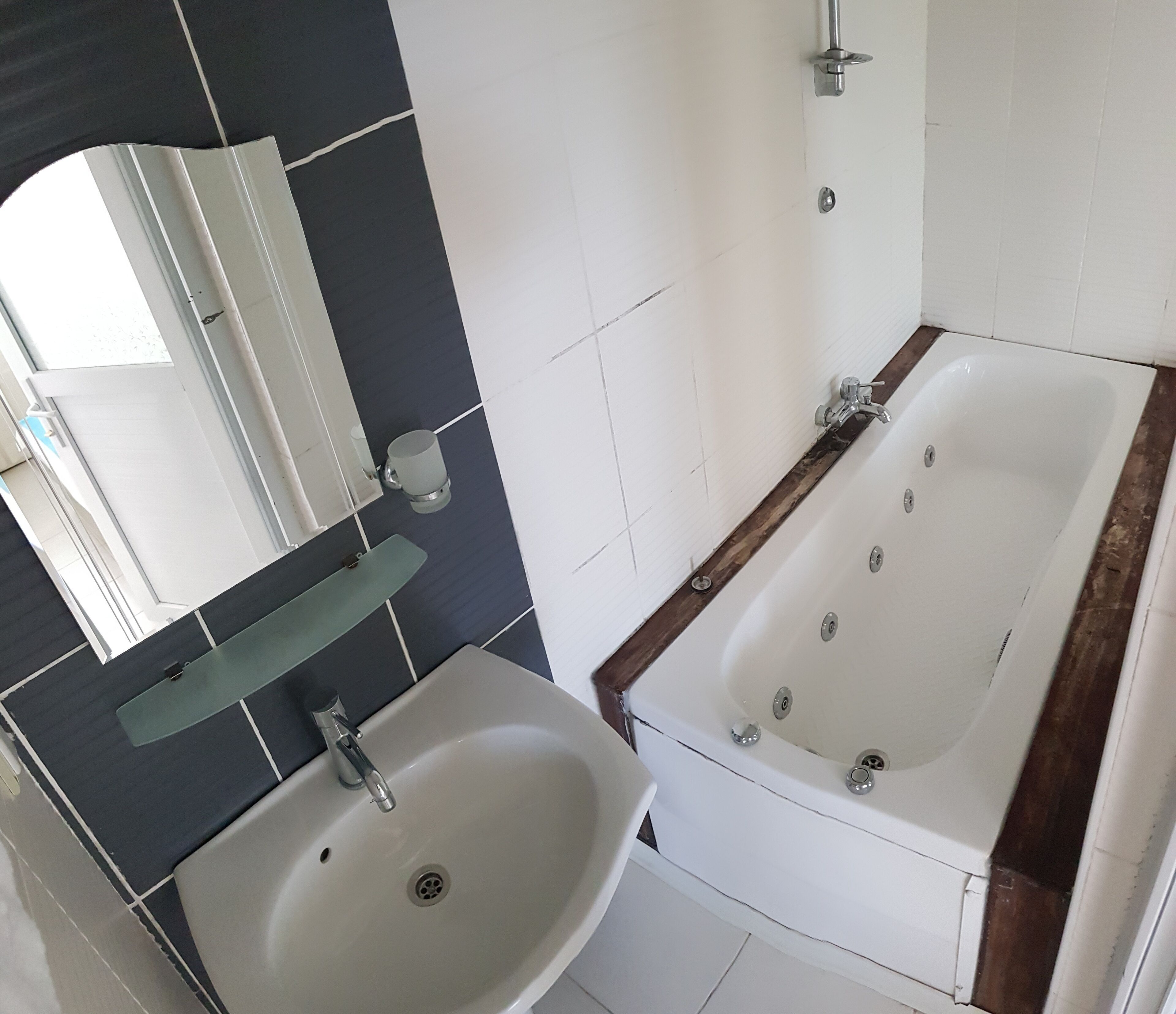 Bathroom | Shower, hair dryer, slippers, towels