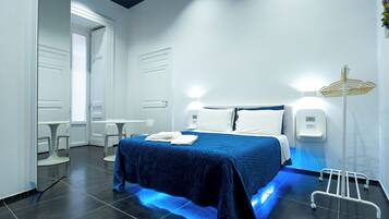 Comfort Room | 1 bedroom, in-room safe, desk, blackout drapes