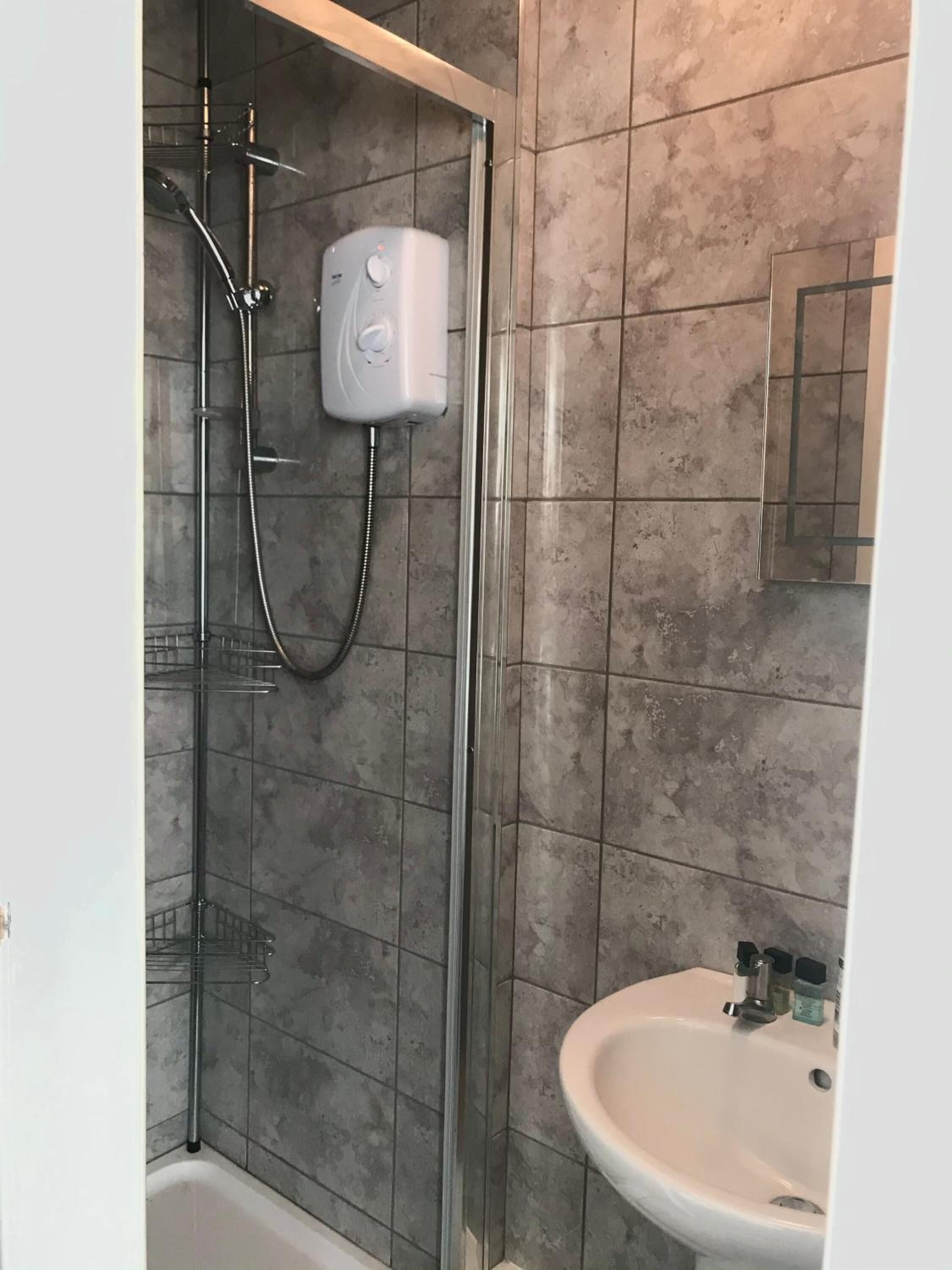 Shower, free toiletries, hair dryer, towels