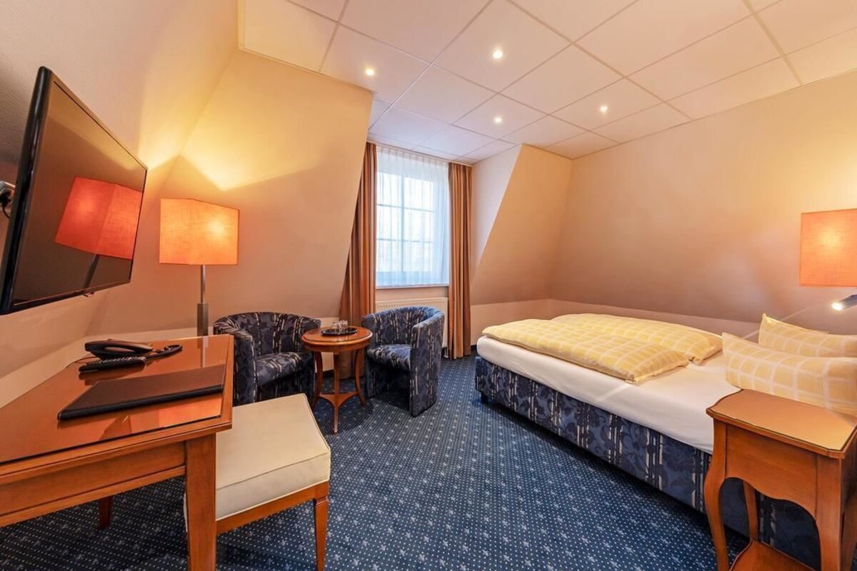 Desk, blackout drapes, WiFi (free), bed sheets