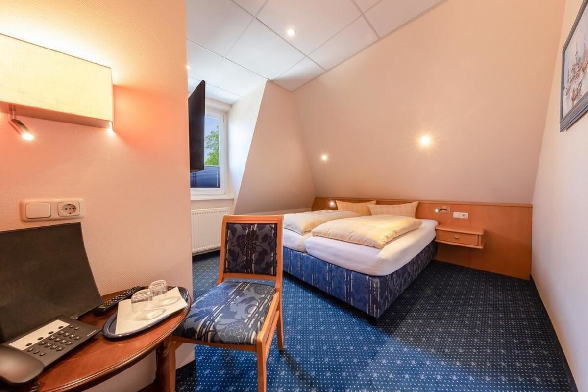 Desk, blackout drapes, WiFi (free), bed sheets