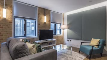 Apartment, 1 Bedroom | Living room | 32-inch flat-screen TV with satellite channels, TV