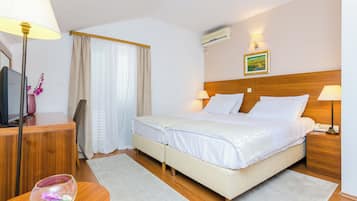 Twin Room (Double or Twin Room with Balcony and ) | Minibar, free cots/infant beds, free WiFi, bed sheets