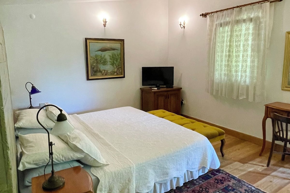 Habitación Deluxe, 1 cama King size, para no fumadores, vista al jardín | Sábanas de algodón egipcio, ropa de cama de alta calidad y edredón