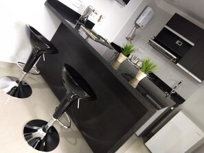 Fridge, microwave - ApartaSuite Poblado Medellin (Medellín)