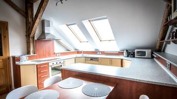 Signature Apartment, 1 Bedroom | Private kitchen | Fridge, microwave, coffee/tea maker, electric kettle