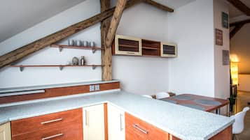 Signature Apartment, 1 Bedroom | Private kitchen | Fridge, microwave, coffee/tea maker, electric kettle