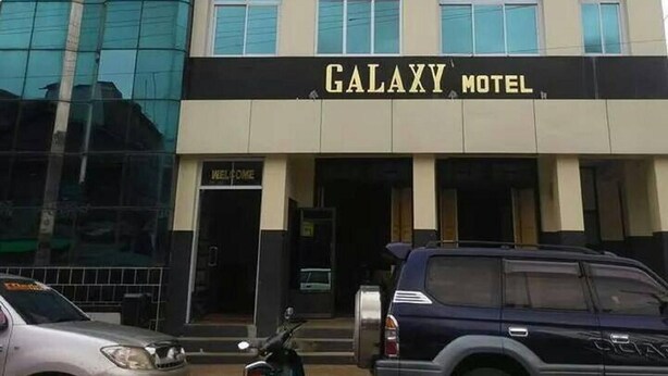 A Galaxy Motel with a modern facade, large windows, and a welcoming entrance. - Galaxy Motel Hpa An (Hpa-An)