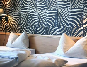 In-room safe, desk, laptop workspace, blackout drapes - Bavaria Safari Hotel (Dachau)