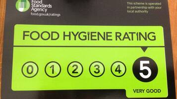 A food hygiene rating card with a 5-star rating and the label "VERY GOOD".