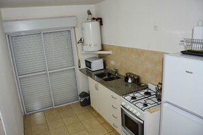 Family Apartment, 1 Bedroom, Kitchenette | Private kitchen | Fridge, microwave, oven, stovetop