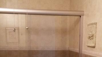 Executive Apartment, 2 Bedrooms | Bathroom | Combined shower/tub, hair dryer, towels