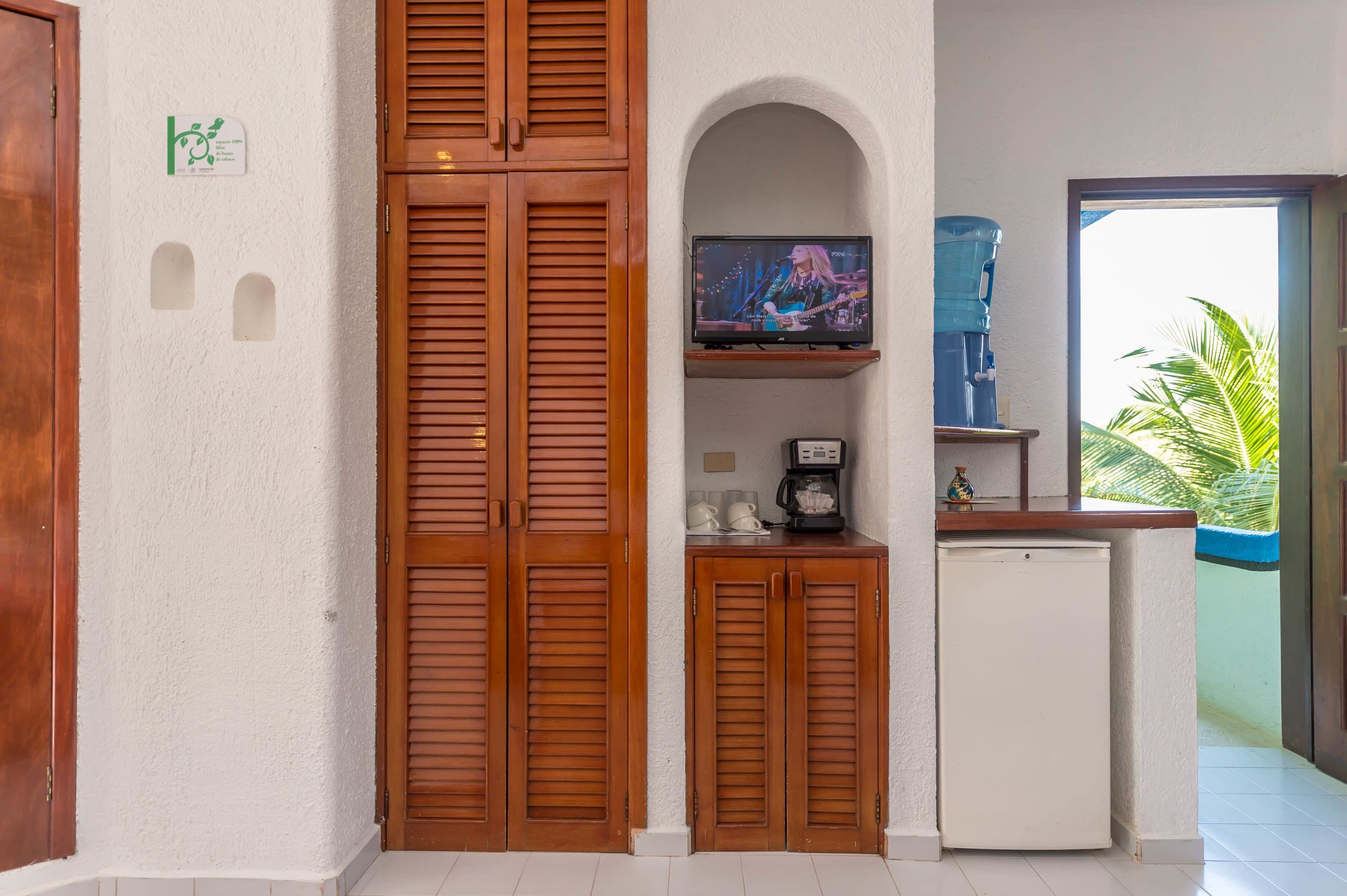 standard double room, 2 queen beds, private bathroom, beach view | room amenity