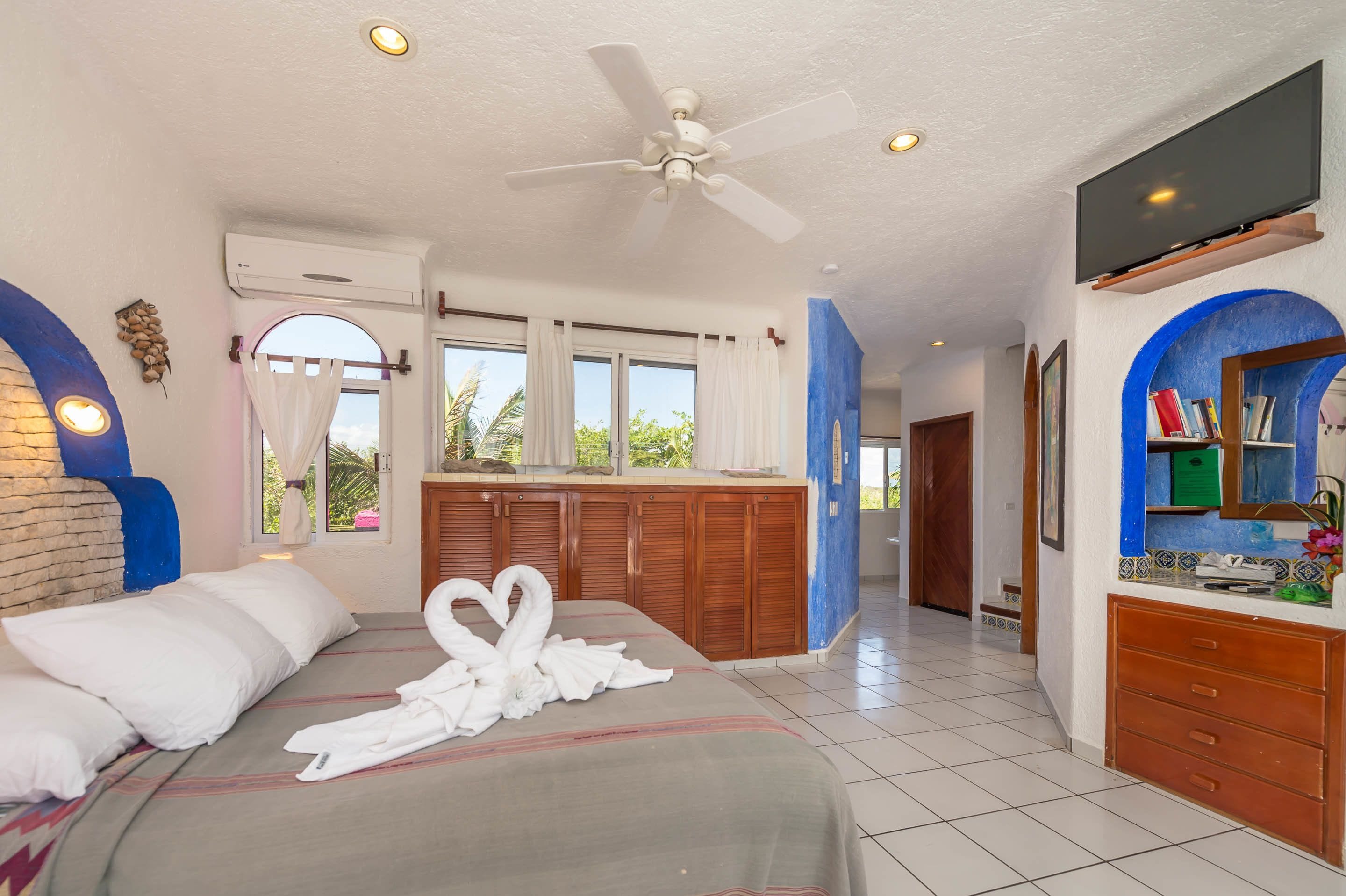honeymoon studio suite, jetted tub, beachfront | 3 bedrooms, in-room safe, iron/ironing board, free cots/infant beds