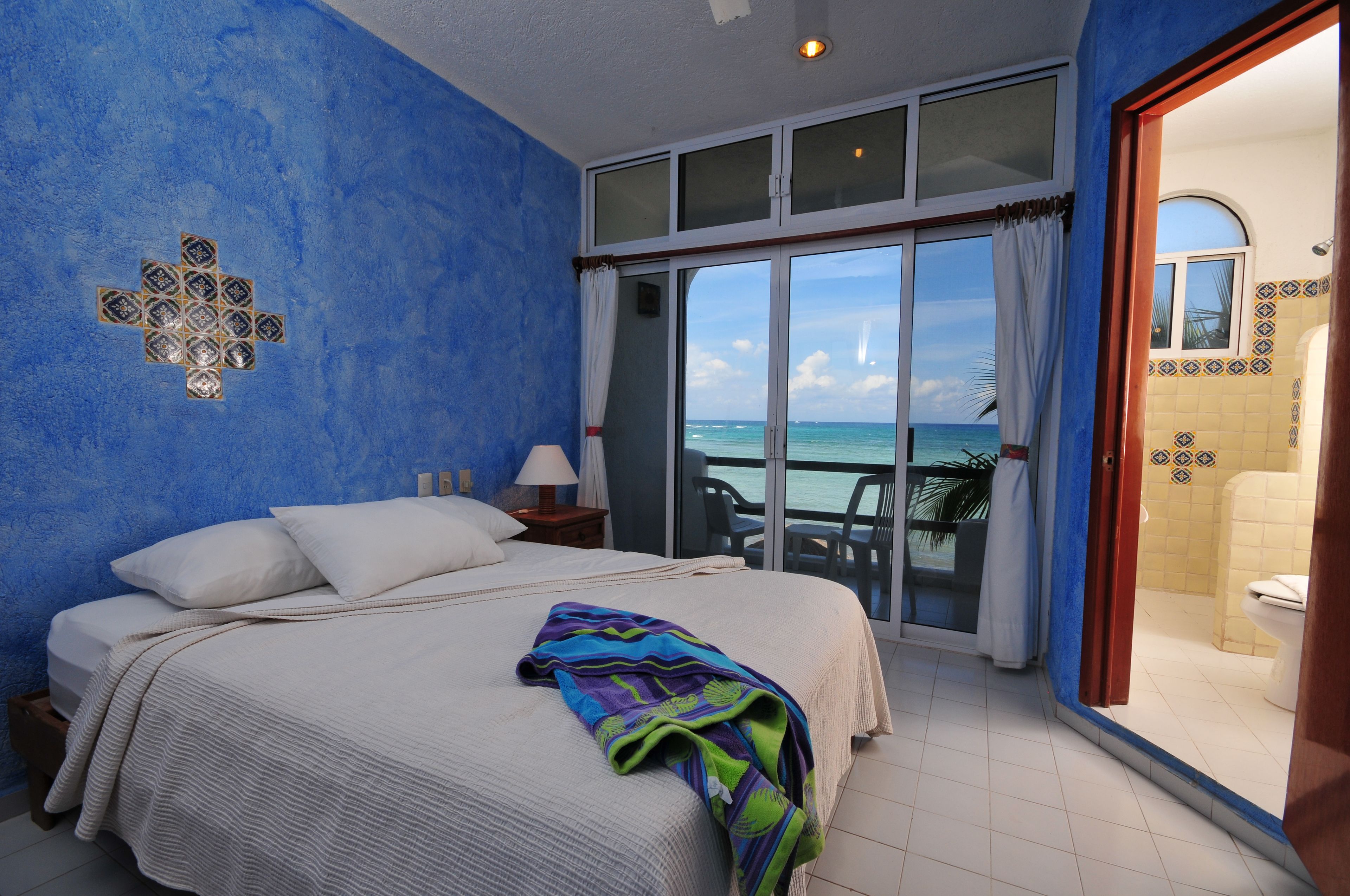 standard single room, 1 queen bed, private bathroom, beachfront | 3 bedrooms, in-room safe, iron/ironing board, free cots/infant beds