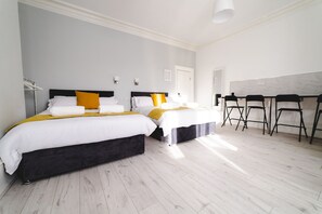 Basic Quadruple Room | Individually decorated, individually furnished, desk, iron/ironing board - Regency Guesthouse Manchester (Manchester)