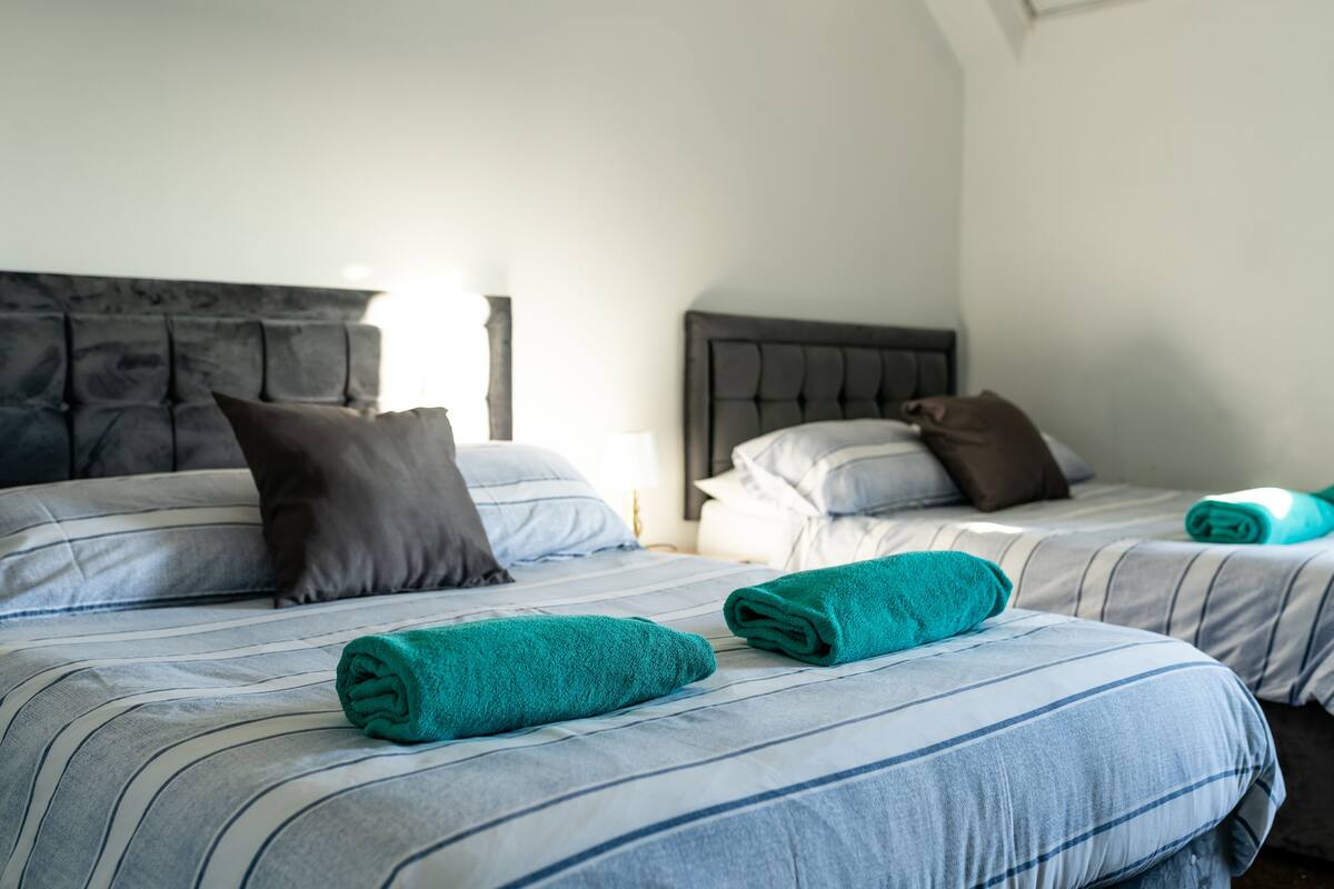 Family Quadruple Room, 2 Double Beds | Individually decorated, individually furnished, desk, iron/ironing board