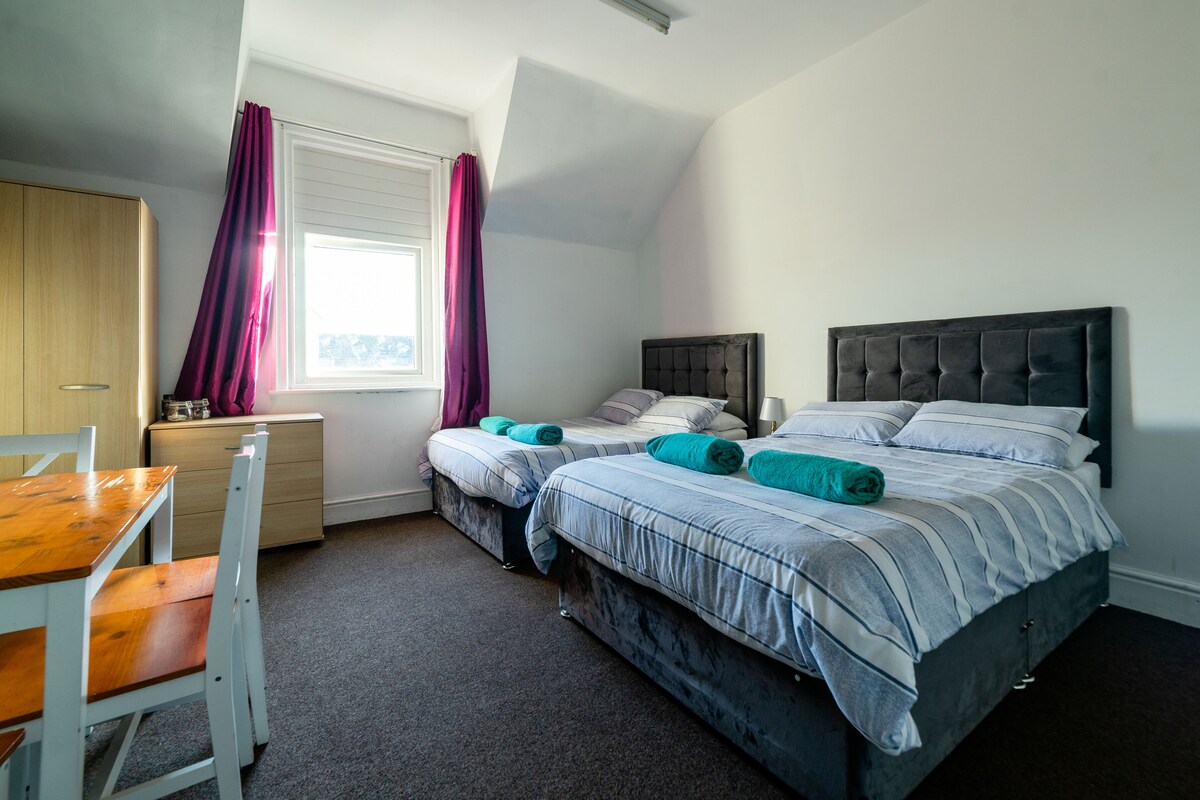 Basic Quadruple Room, 2 Double Beds | Individually decorated, individually furnished, desk, iron/ironing board