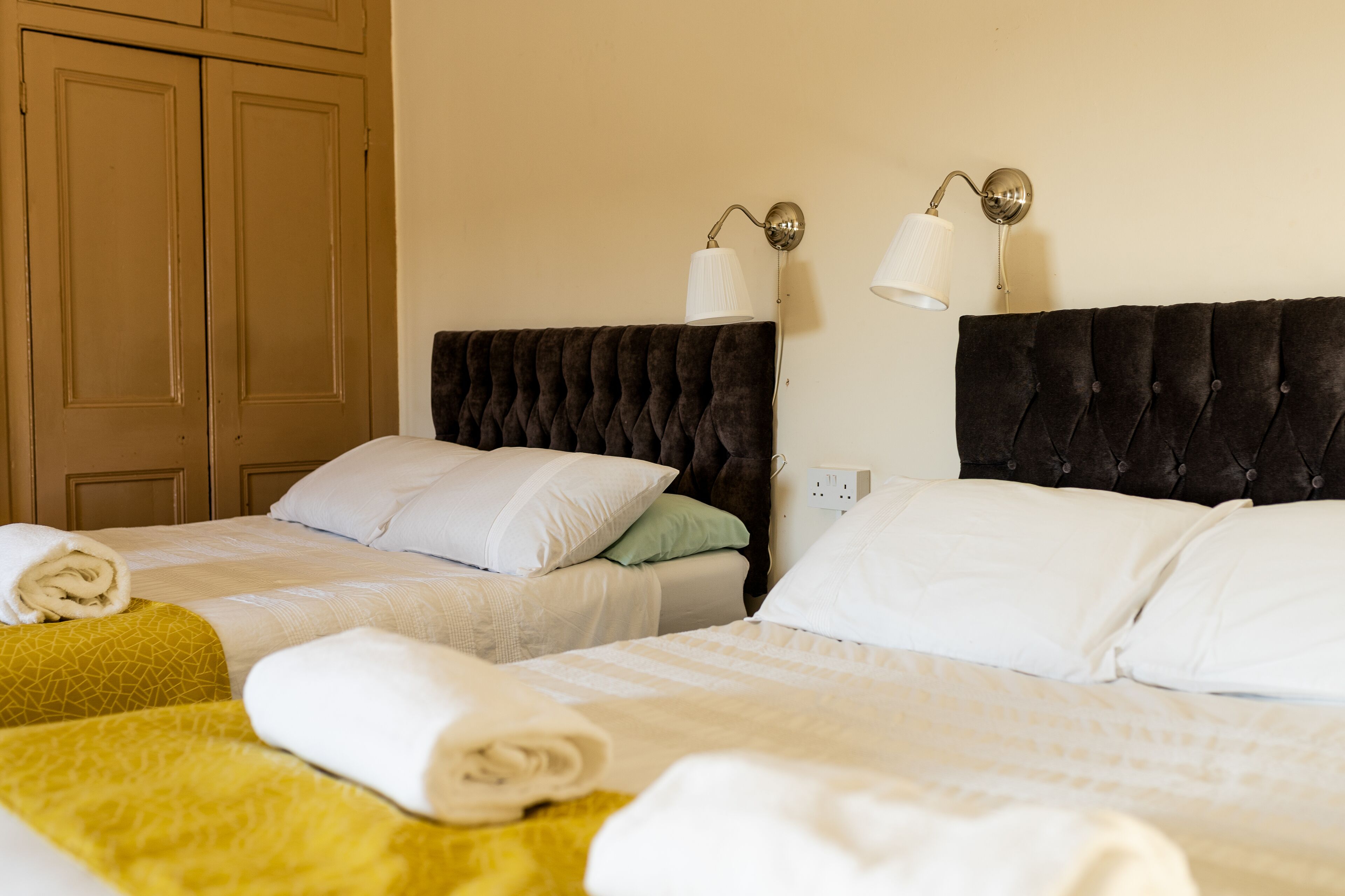 Quadruple Room, 2 Double Beds, Shared Bathroom | Individually decorated, individually furnished, desk, iron/ironing board