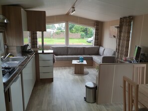 Mobile Home, 2 Bedrooms (Summersun 1) | Living area | Flat-screen TV - Summersun (Sint Maarten)