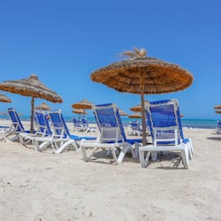 Private beach, white sand, sun loungers, beach umbrellas