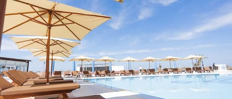 Indoor pool, outdoor pool, open 9:00 AM to 7:00 PM, pool umbrellas