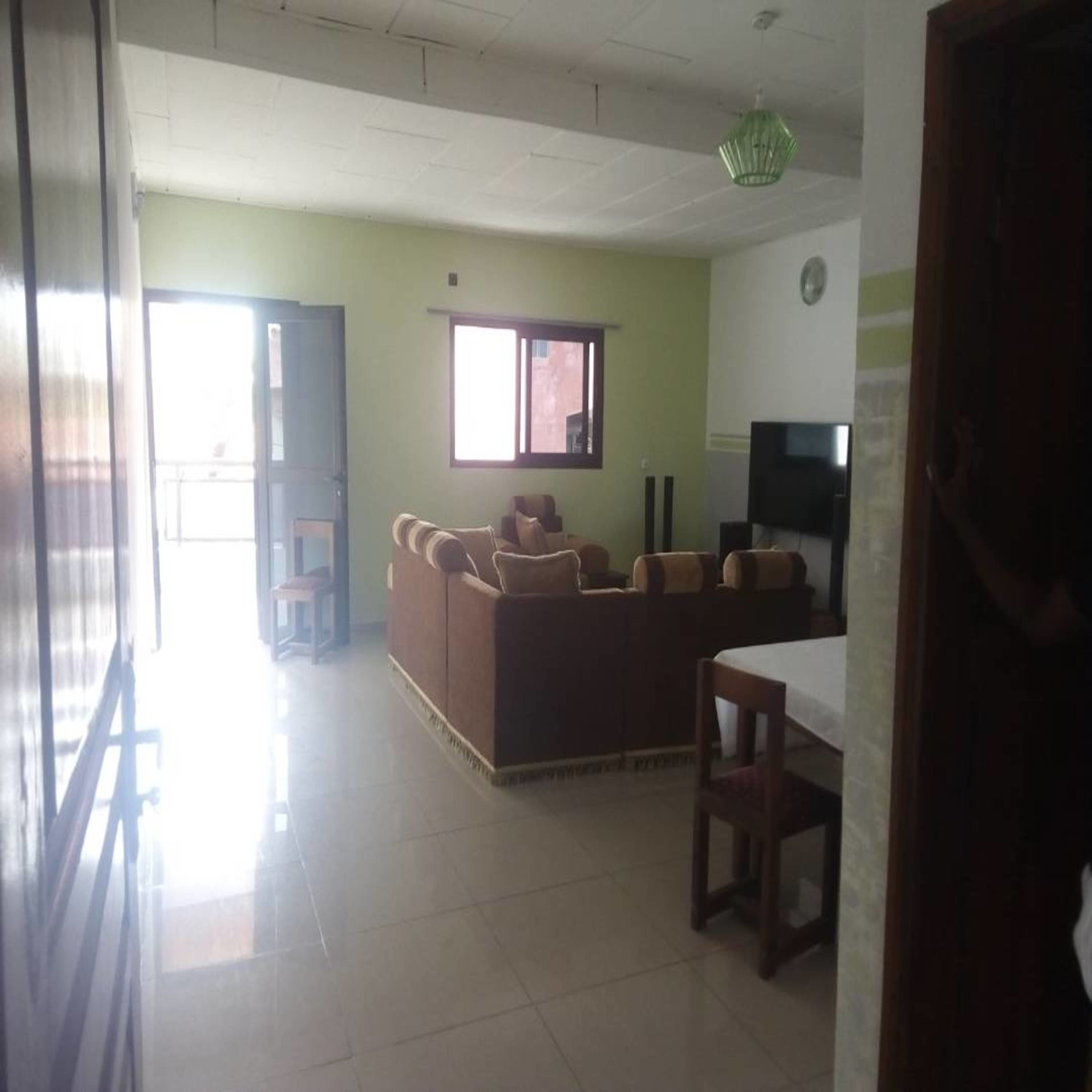 Departamento Confort, 2 habitaciones, para no fumadores | Área de sala de estar | Televisión de plasma 