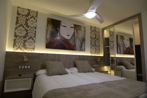 2 عدّة غرف نوم وأغطية فراش متميزة وم يني بار وخزنة داخل الغرفة