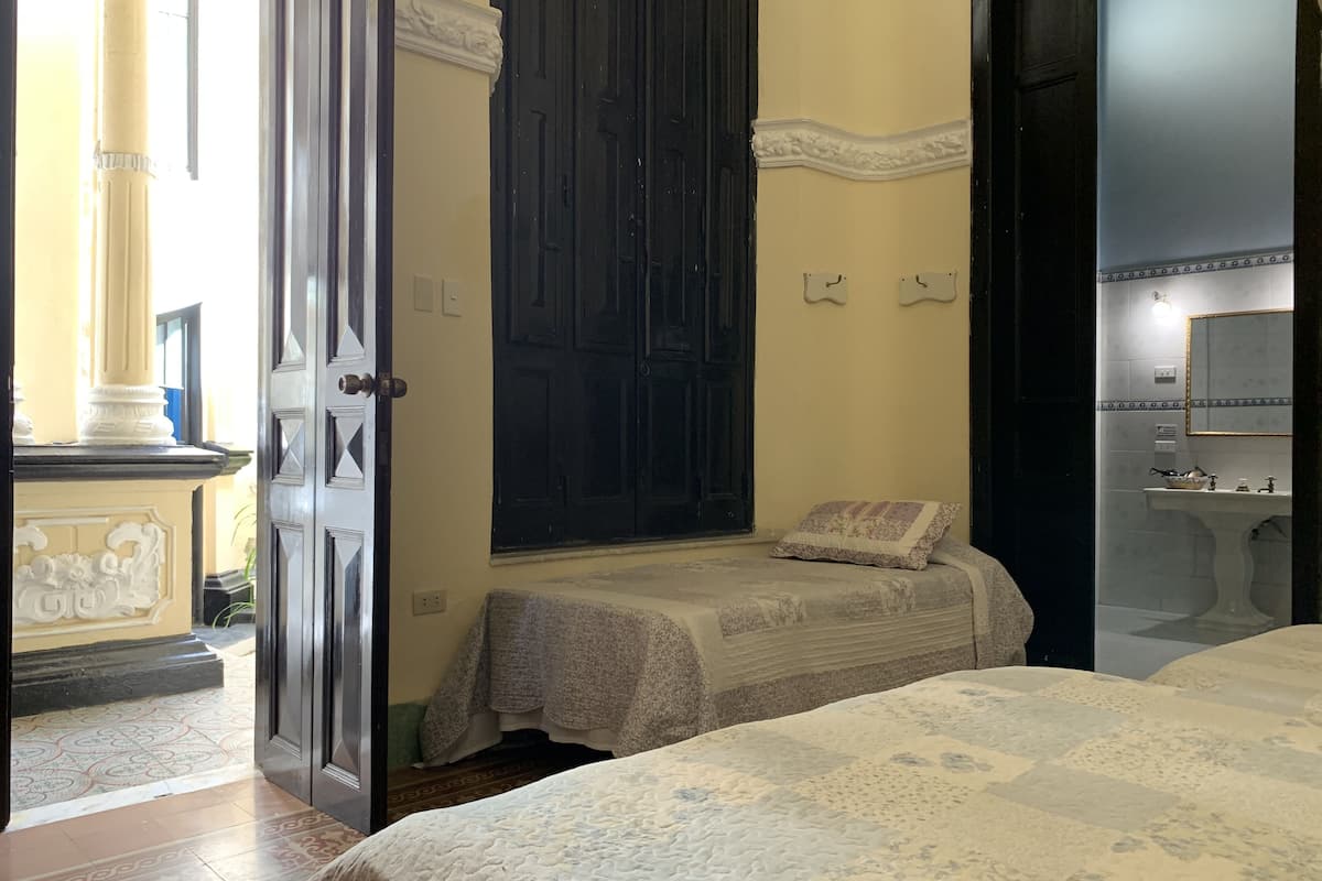 family room | premium bedding, in-room safe, individually decorated, bed sheets