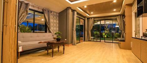 3 Bedrooms Villa | Living area | Flat-screen TV, DVD player