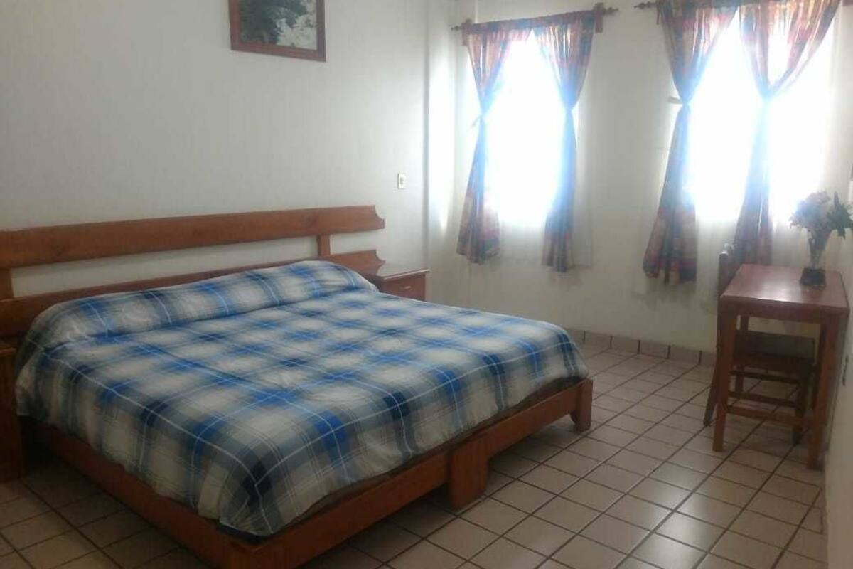 Room, 1 King Bed | Bathroom | Shower, free toiletries, towels