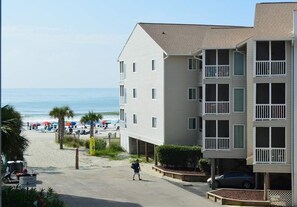 On the beach, sun-loungers
