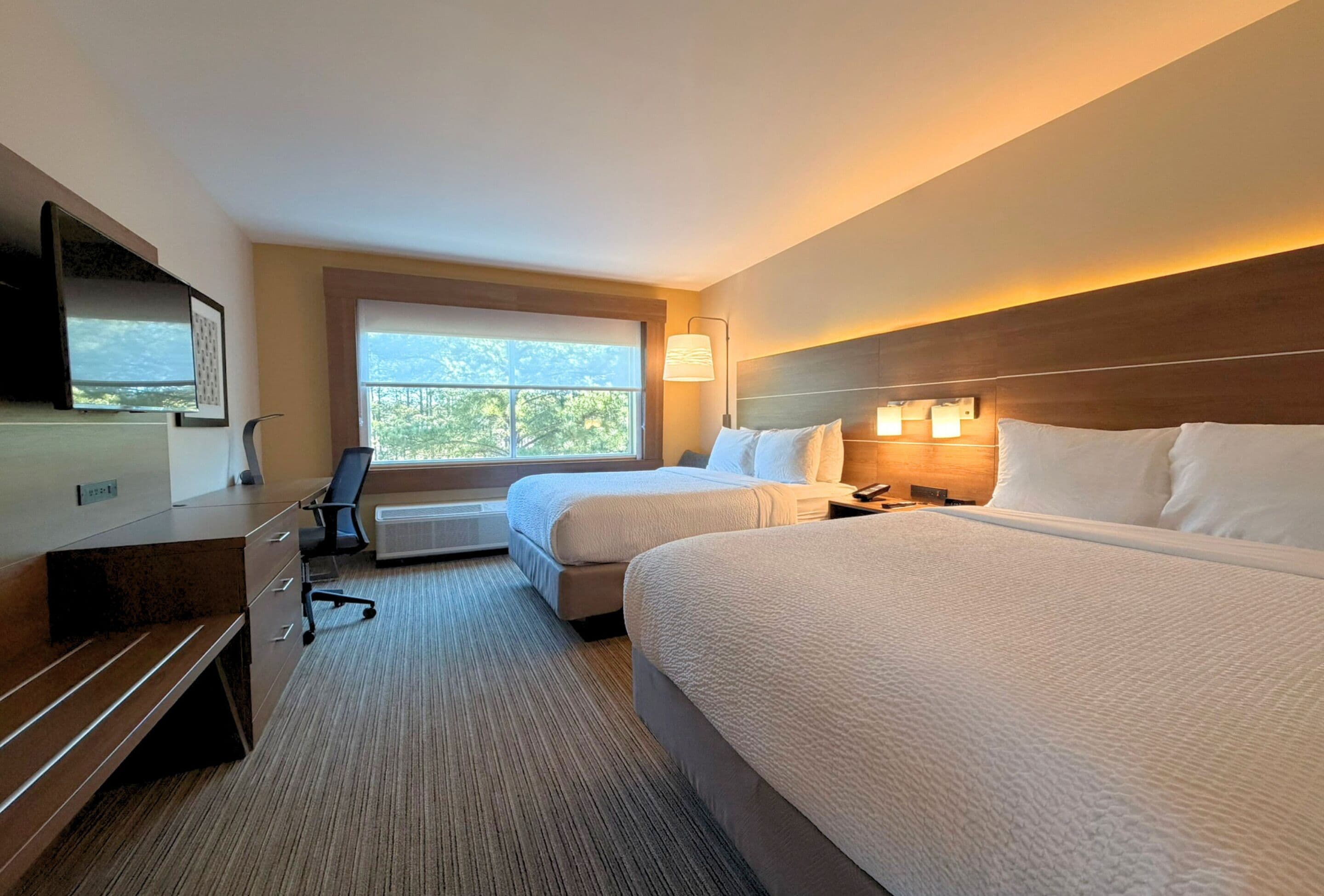 Down duvets, pillow-top beds, desk, laptop workspace