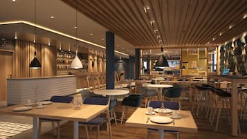 A modern restaurant with multiple dining areas, wooden tables and chairs, and a bar area with shelves of bottles.