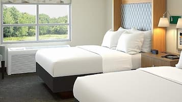 Down duvets, pillow-top beds, desk, laptop workspace