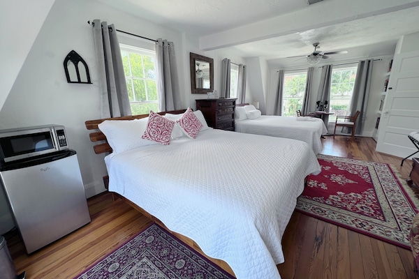 Otto Ringling junior suite from room entrance. Two comfortable king beds