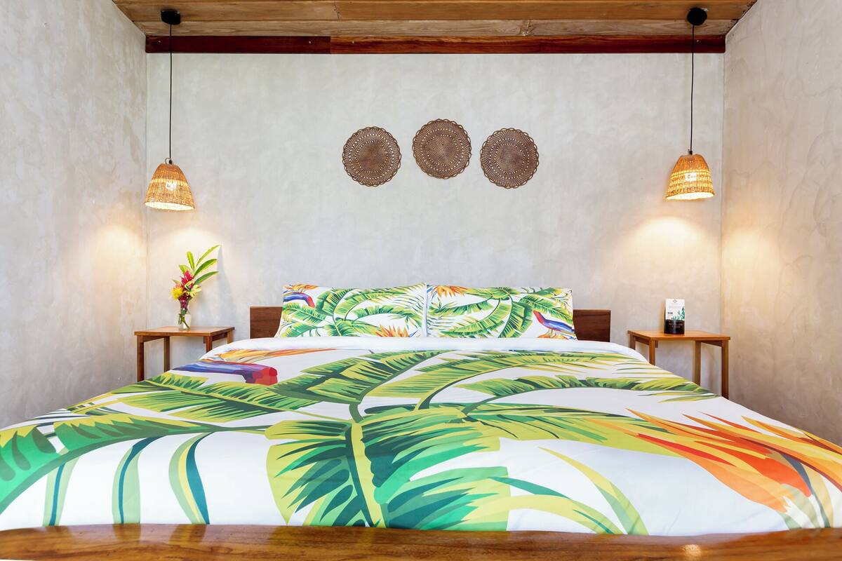 Premium bedding, desk, laptop workspace, soundproofing