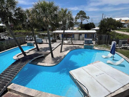 St. George Island Waterfront Apt., Dock, Giant Saltwater Pool, & Fire Pit