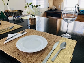 Enjoy a romantic dinner for two in this beautifully set dining area.