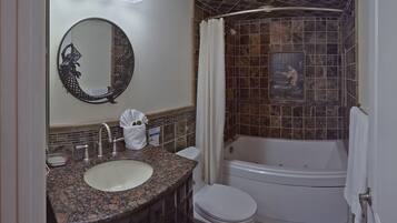 Combined shower/tub, jetted tub, hair dryer, towels