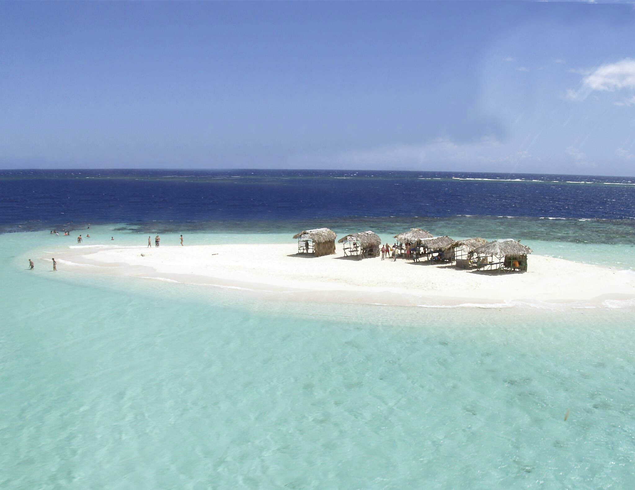 On the beach, sun-loungers, beach towels