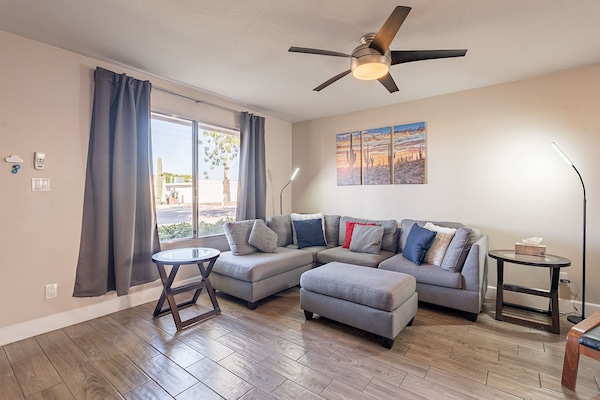 Spacious living area boasts lots of natural light.
