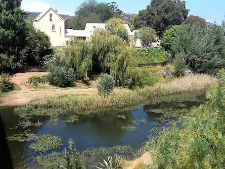 Property grounds. The Mill House - Cottage Accommodation includes breakfast provisions